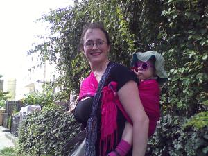 Back carry. Bag in front.