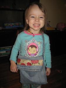 The little one being a cute model.