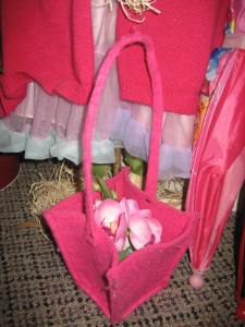 Rosie's Easter basket with a few flowers and Easter eggs mixed in.