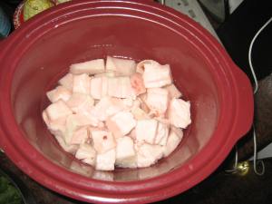 Pork fat in crock pot - ready to cook.